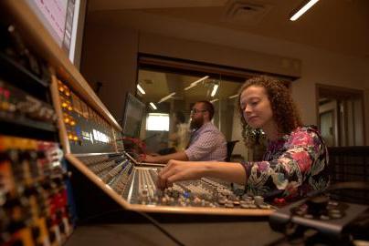 A student works on music tech.